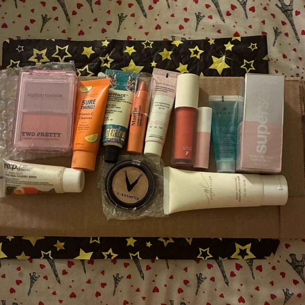 12 NWoT Assorted Skincare and Beauty Products plus two cosmetic bags of your c.